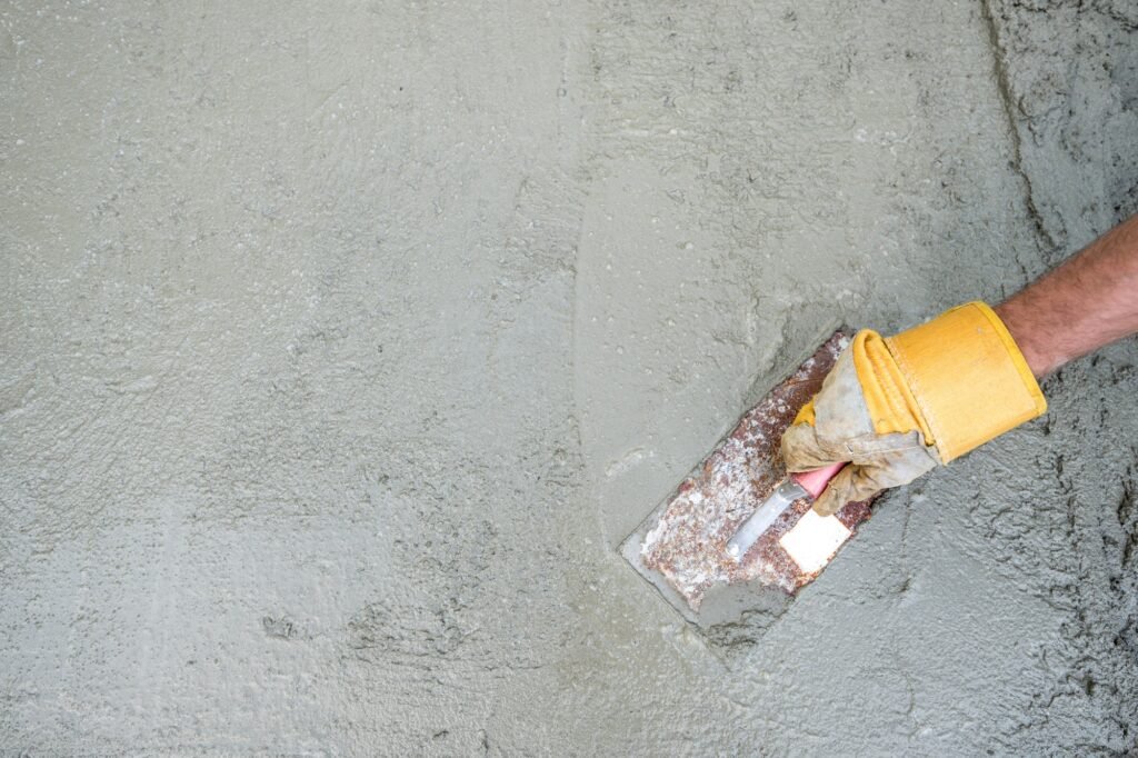 Workman or builder doing plastering